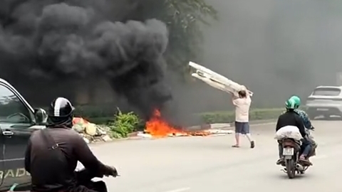 Xử phạt người đốt rác tạo khói đen bao trùm cầu Thăng Long