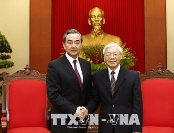 越共中央总书记阮富仲会见中国国务委员兼外交部长王毅