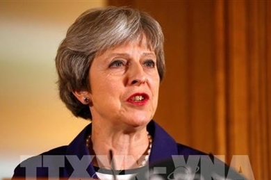 英脱欧：英国首相呼吁团结解决问题