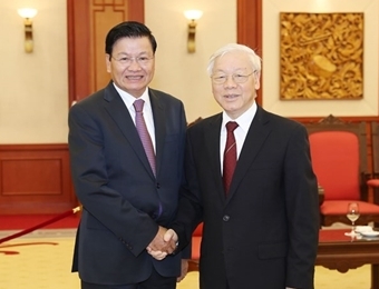 越共中央总书记阮富仲会见老挝总理通伦