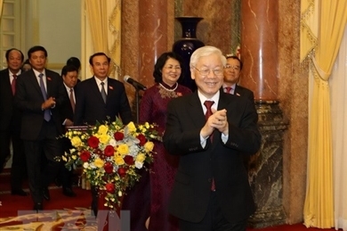 越共中央总书记、国家主席阮富仲会见越南国家主席办公厅全体干部人员