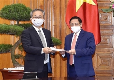 越南政府总理范明政会见日本驻越南大使山田贵雄