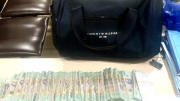 Bỏ quên túi hàng hiệu chứa tiền tỷ tại sân bay Nội Bài