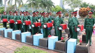 An táng 18 hài cốt liệt sĩ quân tình nguyện và chuyên gia Việt Nam
