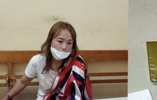 Thiếu phụ ôm 2 bánh heroin băng rừng