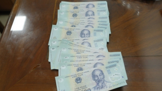 Bắt nhóm đối tượng tàng trữ, lưu hành tiền giả