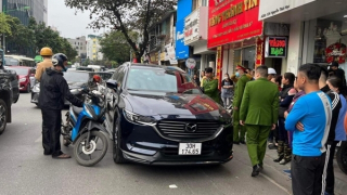 Công an thông tin về hình ảnh đối tượng dùng súng nghi chặn cướp xe chở tiền