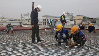 Làm việc xuyên Tết để hoàn thiện Nhà hát Hồ Gươm