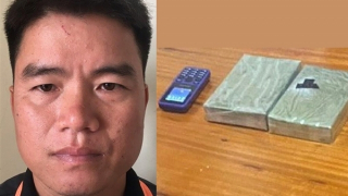 Khởi tố kẻ "ôm" 2 bánh heroin