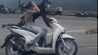 Khởi tố cặp vợ chồng “làm xiếc” trên đèo Hải Vân