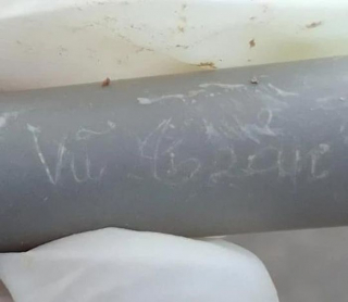 Phát hiện mộ chí có ống nhựa chứa thông tin liệt sĩ