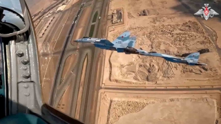 Su-35S mang tên lửa hộ tống ông Putin thăm Trung Đông