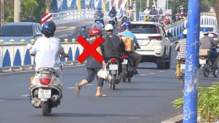 Cảnh báo tai nạn vì người đi bộ sang đường sai luật
