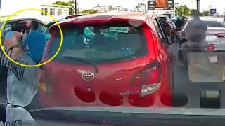 Công an triệu tập tài xế taxi tấn công người phụ nữ giữa đường