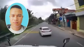 Bị khởi tố vì lái xe 4 chỗ đánh võng trước đầu xe container