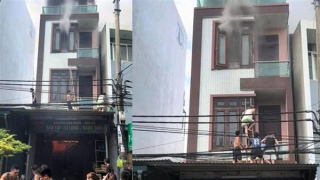 Người dân trèo tường cứu 4 người trong đám cháy