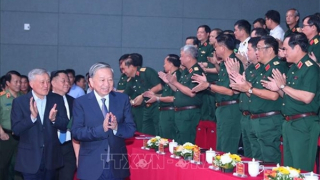 Tổng Bí thư Tô Lâm dự giao lưu nghệ thuật 'Khắc ghi lời Bác - vang nhịp quân hành'