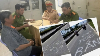 Xử phạt người đàn ông vẽ chữ “có bắn tốc độ” trên mặt đường