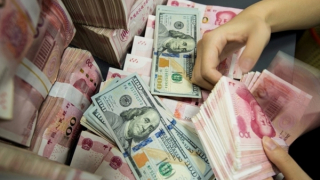 Vì sao Nhân dân tệ tăng giá so với USD?