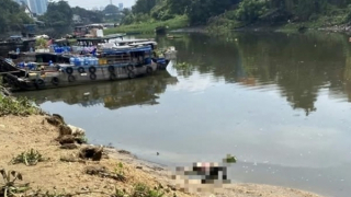 Thi thể xăm 2 con thằn lằn ở bụng nổi trên sông Sài Gòn