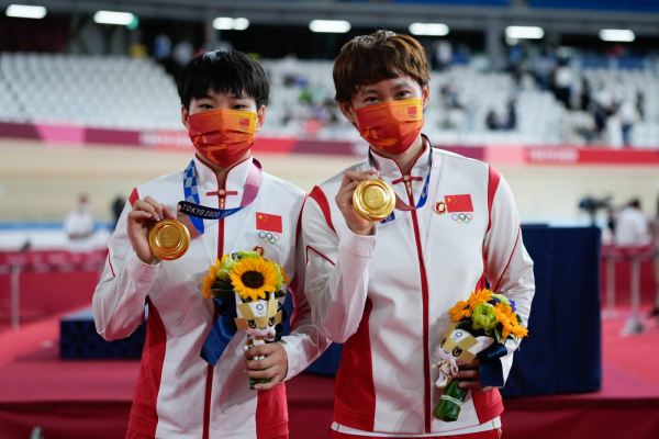 Trung Quốc cam kết không để các VĐV Olympic đeo huy hiệu Mao Trạch Đông  -0
