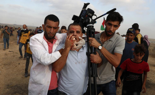 Israel bắn người biểu tình Palestine, 26 người bị thương  -0