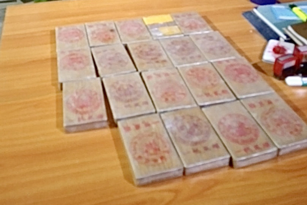 Bắt đối tượng vận chuyển 19 bánh heroin ở Điện Biên - Ảnh 1.