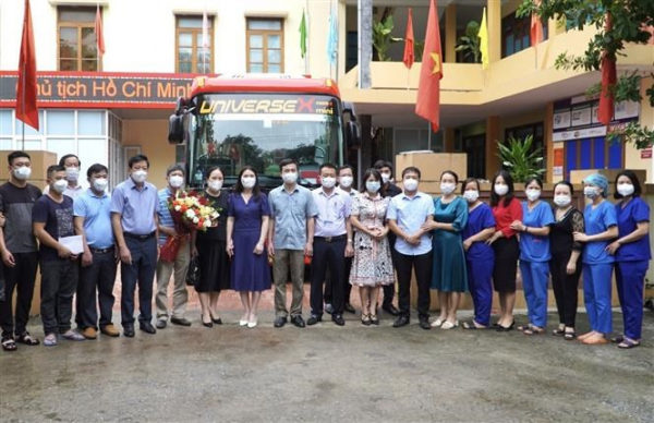 Cử đoàn y tế qua giúp tỉnh Khăm Muộn (Lào) phòng chống dịch COVID-19 -0