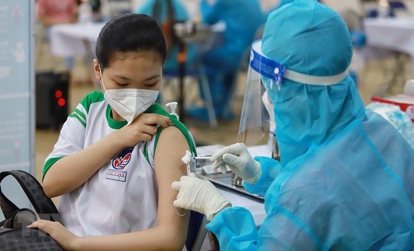 HCM City begins vaccinating school children against COVID-19 -0