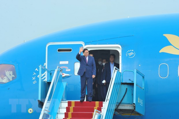 PM Chinh returns to Hanoi from European tour -0