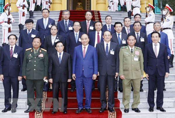 Chủ tịch nước Nguyễn Xuân Phúc tiếp Thủ tướng Lào Phankham Viphavanh -0