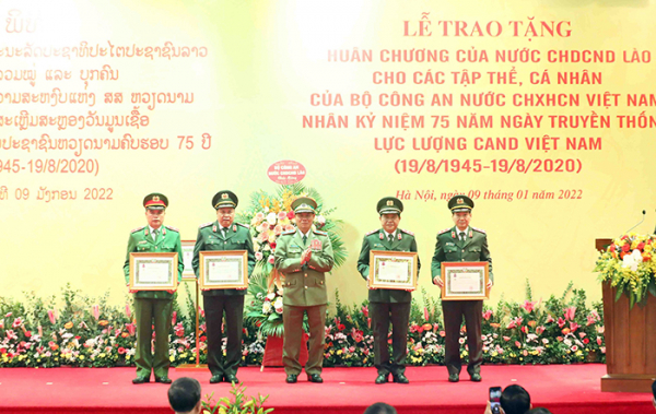 Đưa quan hệ hợp tác giữa hai Bộ Công an Việt - Lào lên tầm cao mới -0