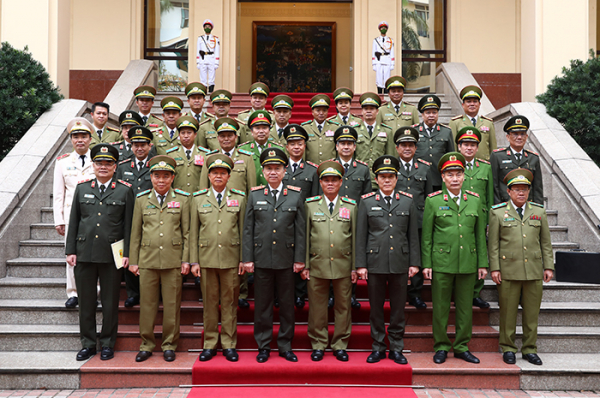 Đưa quan hệ hợp tác giữa hai Bộ Công an Việt - Lào lên tầm cao mới -0