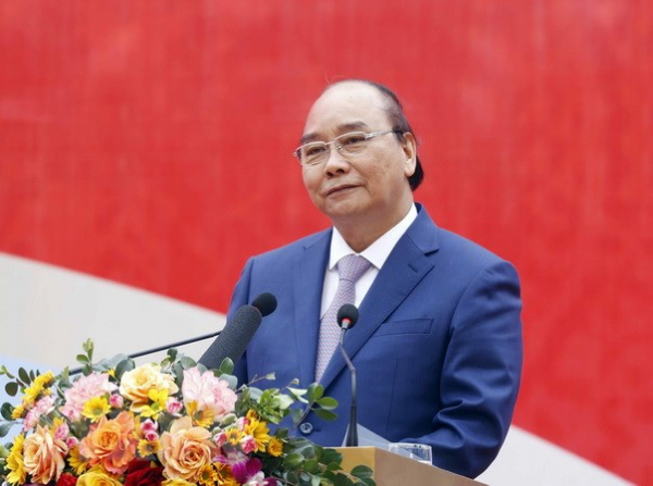 Chủ tịch nước Nguyễn Xuân Phúc trao quà Tết cho các hộ nghèo ở Đà Nẵng -0