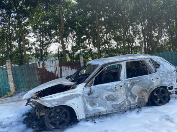 Phát hiện thi thể cháy đen trong chiếc xe cháy rụi ở Vĩnh Phúc -0
