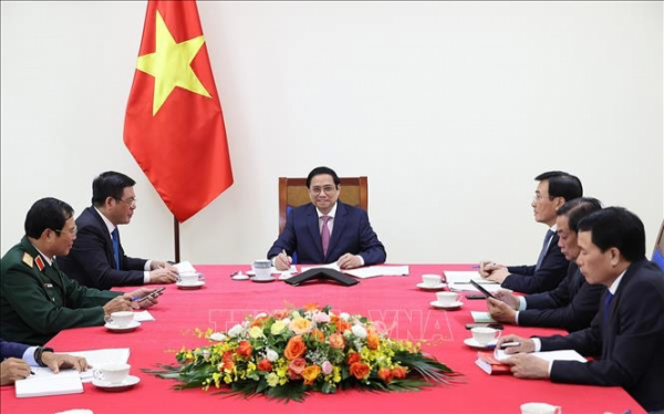 Thủ tướng Phạm Minh Chính điện đàm với Thủ tướng Quốc vụ viện Trung Quốc -0