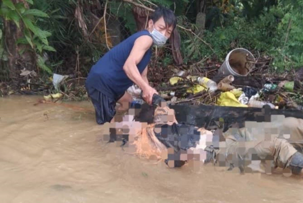 Bàng hoàng phát hiện thi thể người đàn ông nổi trên sông Như Ý -0