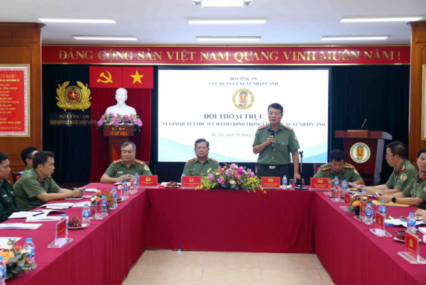 Dialogue on administrative procedures for immigration held in Hanoi -0