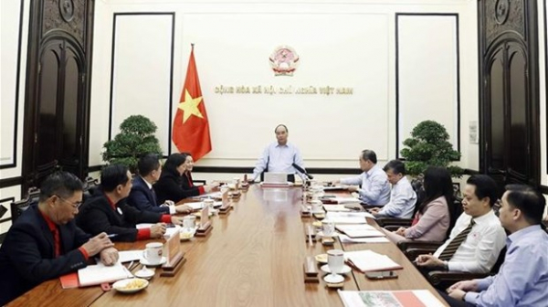 President asks Red Cross society to help the poor enjoy Lunar New Year -0