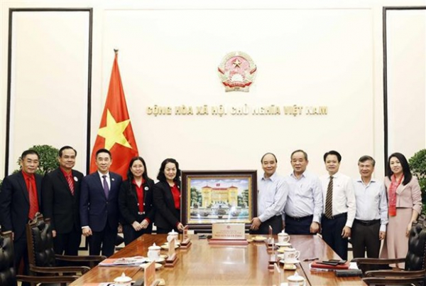 President asks Red Cross society to help the poor enjoy Lunar New Year -0