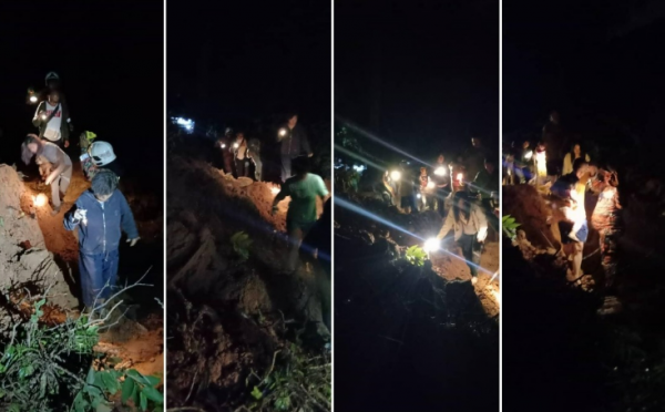 100 người nghi mắc kẹt do sạt lở đất tại khu cắm trại Malaysia -0