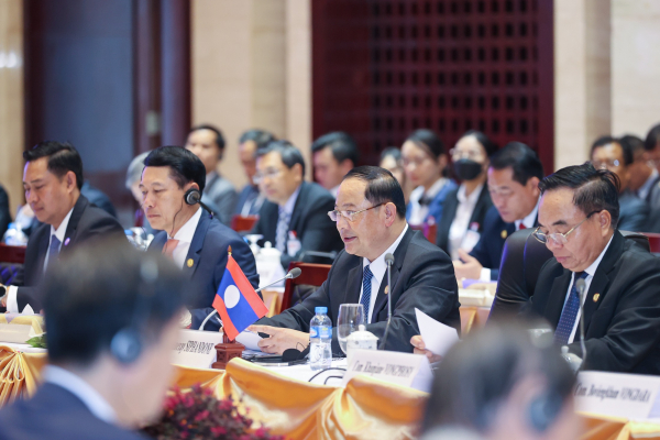 Thúc đẩy hợp tác chính trị, đối ngoại, an ninh quốc phòng, đầu tư thương mại Việt Nam - Lào -1