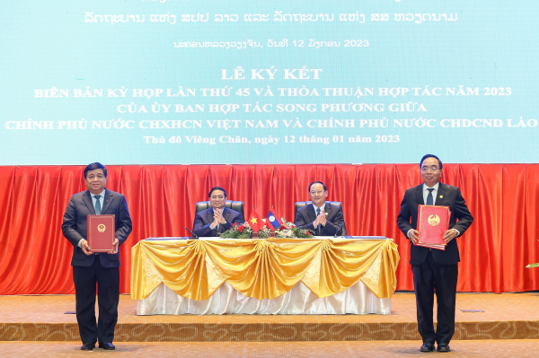 Thúc đẩy hợp tác chính trị, đối ngoại, an ninh quốc phòng, đầu tư thương mại Việt Nam - Lào -0