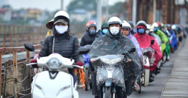 Cold wave grips northern Vietnam before drizzling rain falls -0