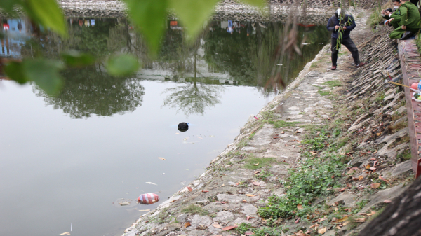 Điều tra nguyên nhân nhân viên y tế tử vong dưới hồ Quang Minh -0