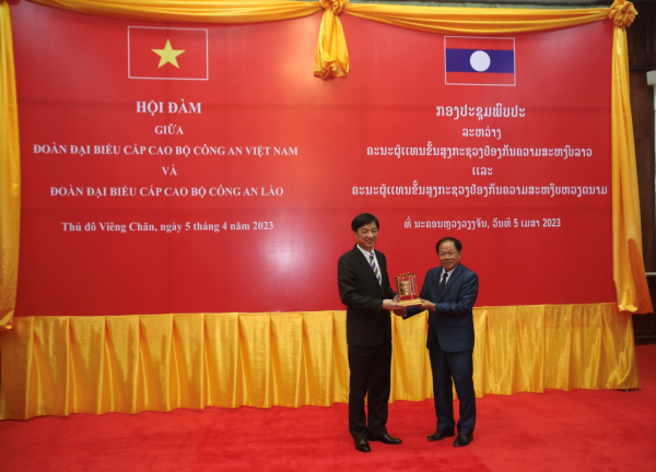 Phối hợp chặt chẽ, triển khai hiệu quả các dự án, chương trình hành động, hợp tác giữa hai Bộ Công an Việt Nam – Lào -0