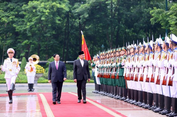 PM Pham Minh Chinh hosts welcome ceremony for Malaysian counterpart -0