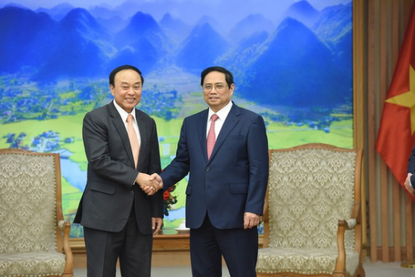 Thủ tướng Phạm Minh Chính tiếp Bộ trưởng Y tế Lào -0