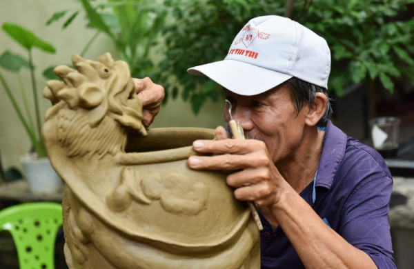 Hoi An pottery village attracts foreign visitors -9