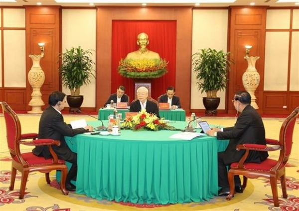 Party leaders of Vietnam, Cambodia, Laos hold high-level meeting in Hanoi -0